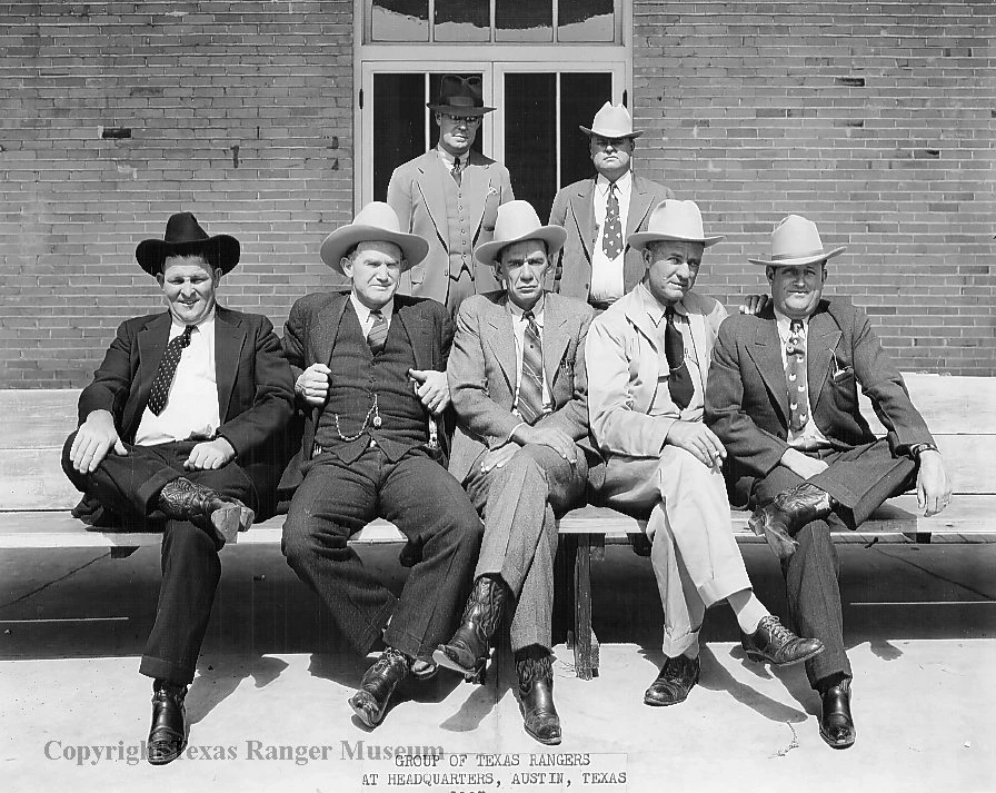 Texas Rangers at the Austin Headquarters, 1938. Maro W. Williamson is seated at the far right. Texas Ranger Hall of Fame and Museum, Waco, Texas. https://texasranger.pastperfectonline.com/photo/4243D8BA-5BCE-4625-A5CB-978903395950.