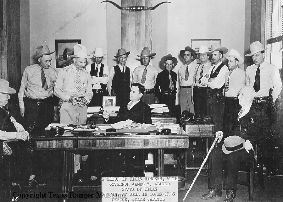 Texas Rangers with Governor Allred, 1935. Maro Williamson appears as the tenth man standing from the left. Texas Ranger Hall of Fame and Museum, Waco, Texas. https://texasranger.pastperfectonline.com/photo/6EE71B66-A25E-42BF-914A-263540406139.