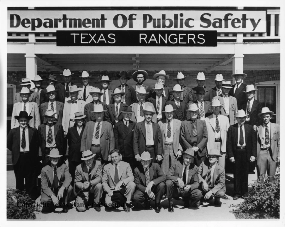 Texas Rangers, September 26, 1938. M.W. Williamson appears in the third row, fifth from the left. Roscoe D. Holliday appears also appears in the third row, ninth from the left. Texas Ranger Hall of Fame and Museum, Waco, Texas. https://texasranger.pastperfectonline.com/photo/E6DCEC51-1034-49D3-89A7-442571758844.
